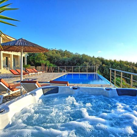 Beachfront Villa Seasun By Posarellivillas Agios Spyridon  Dış mekan fotoğraf