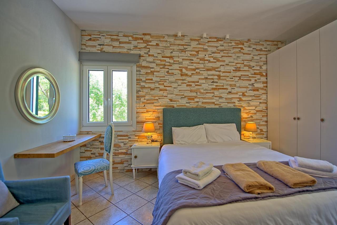 Beachfront Villa Seasun By Posarellivillas Agios Spyridon  Dış mekan fotoğraf