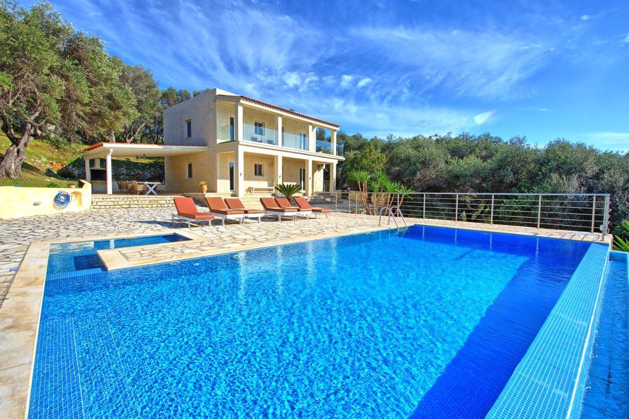 Beachfront Villa Seasun By Posarellivillas Agios Spyridon  Dış mekan fotoğraf