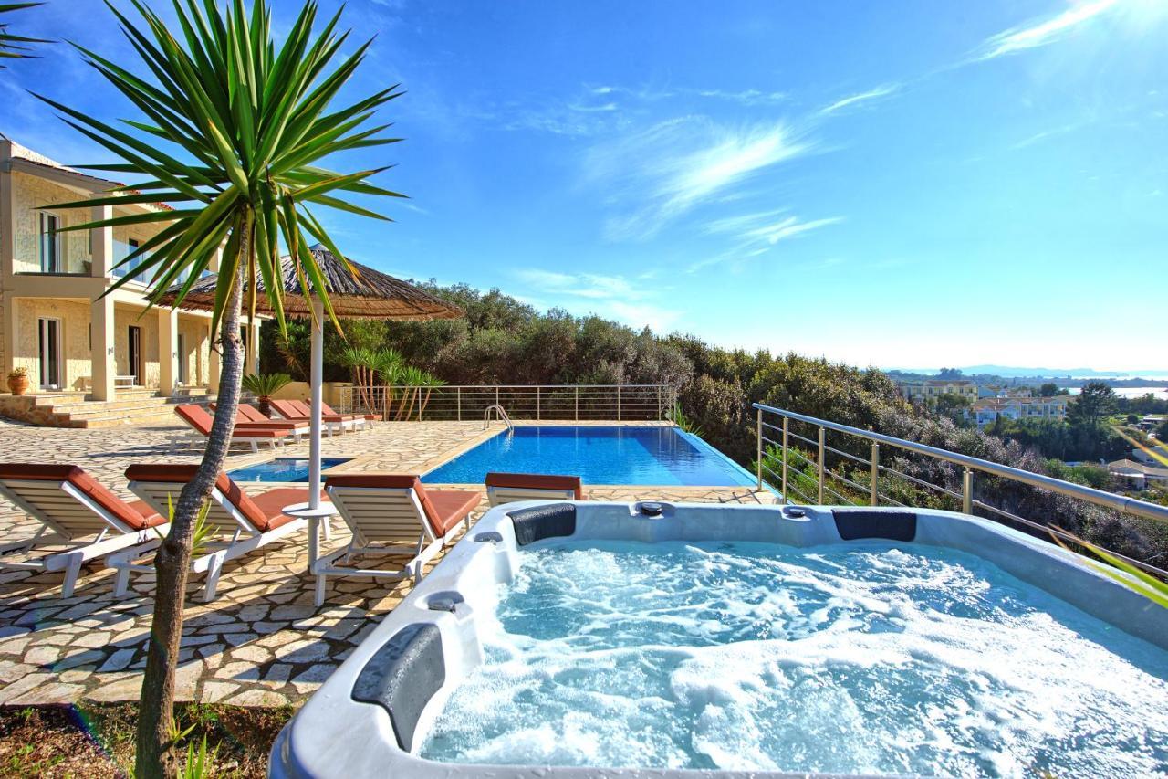 Beachfront Villa Seasun By Posarellivillas Agios Spyridon  Dış mekan fotoğraf