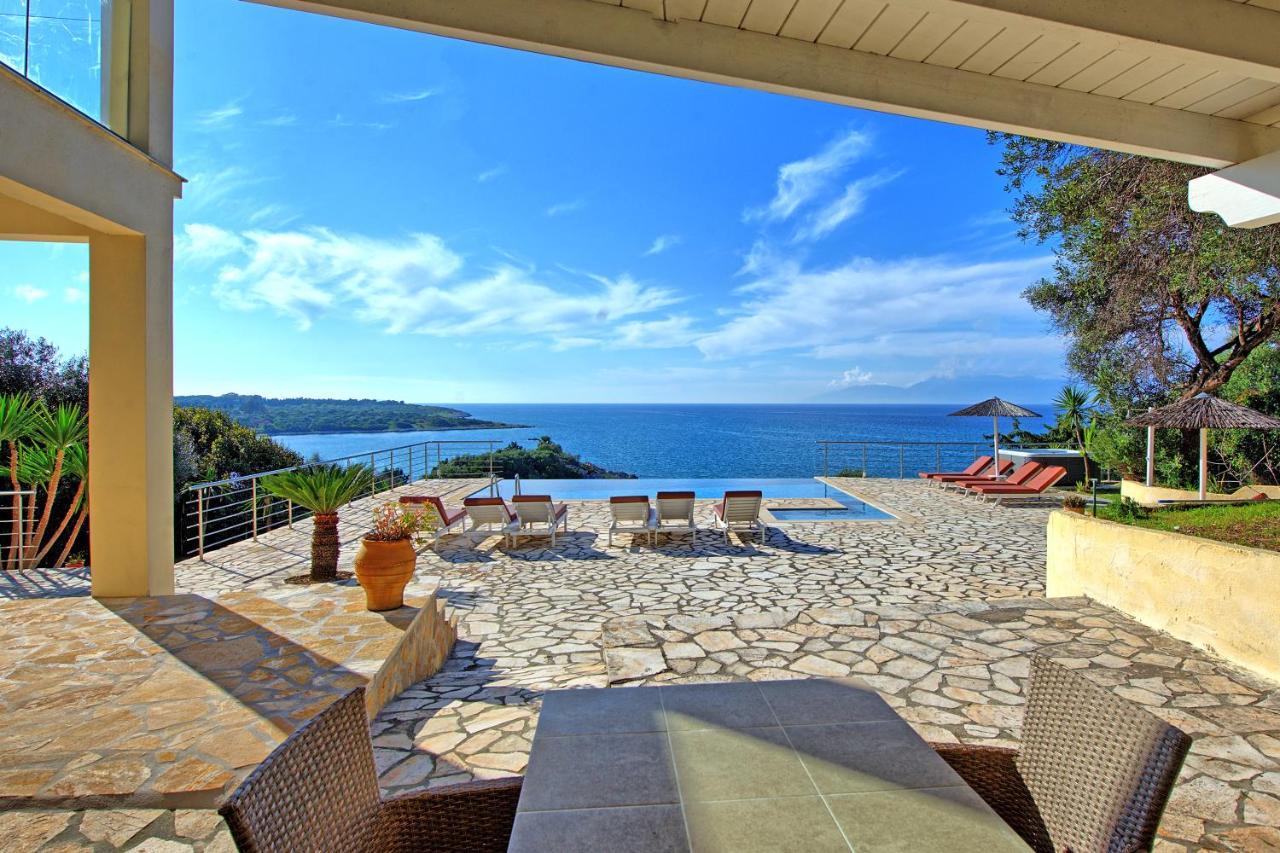 Beachfront Villa Seasun By Posarellivillas Agios Spyridon  Dış mekan fotoğraf