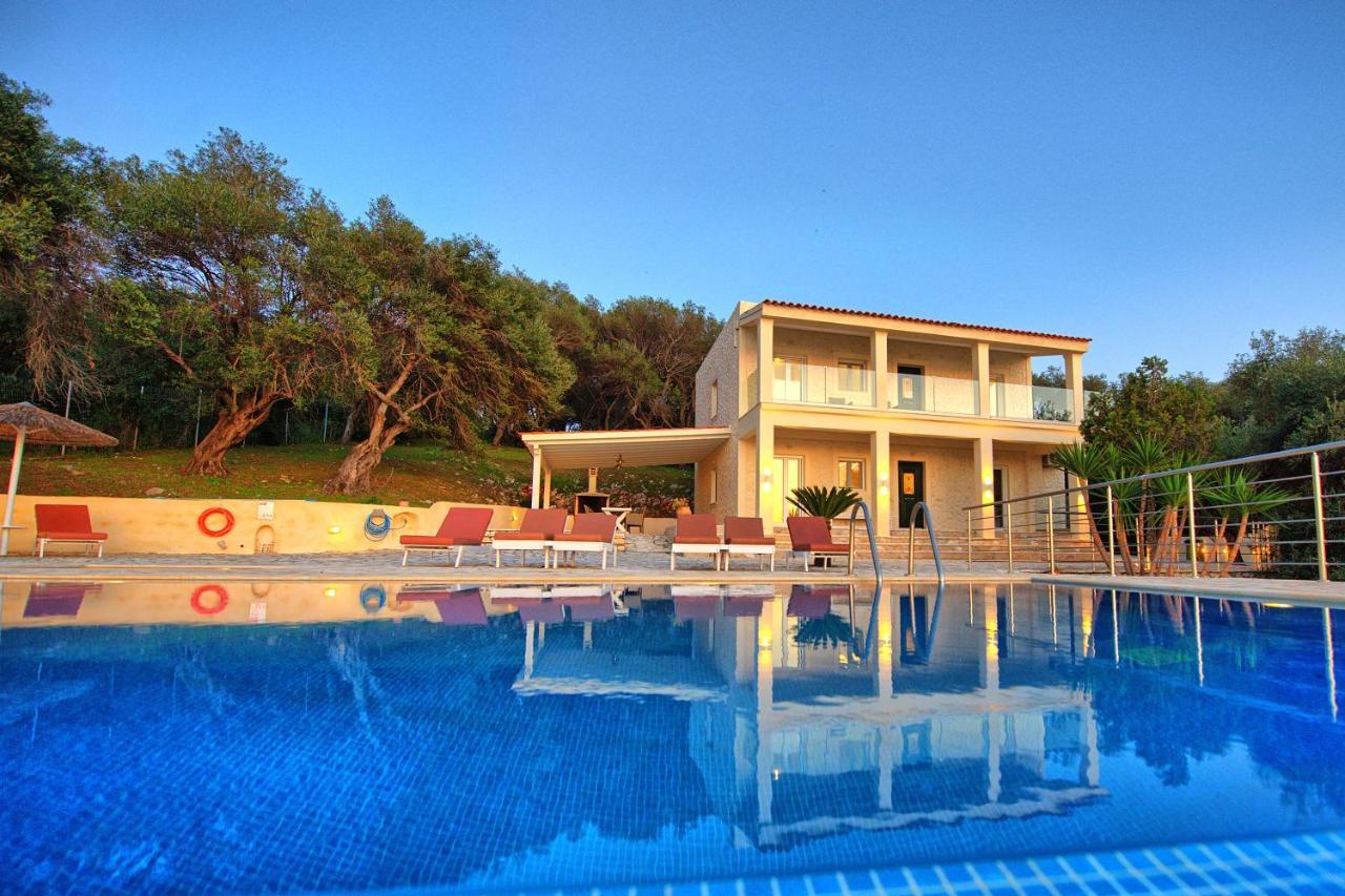 Beachfront Villa Seasun By Posarellivillas Agios Spyridon  Dış mekan fotoğraf