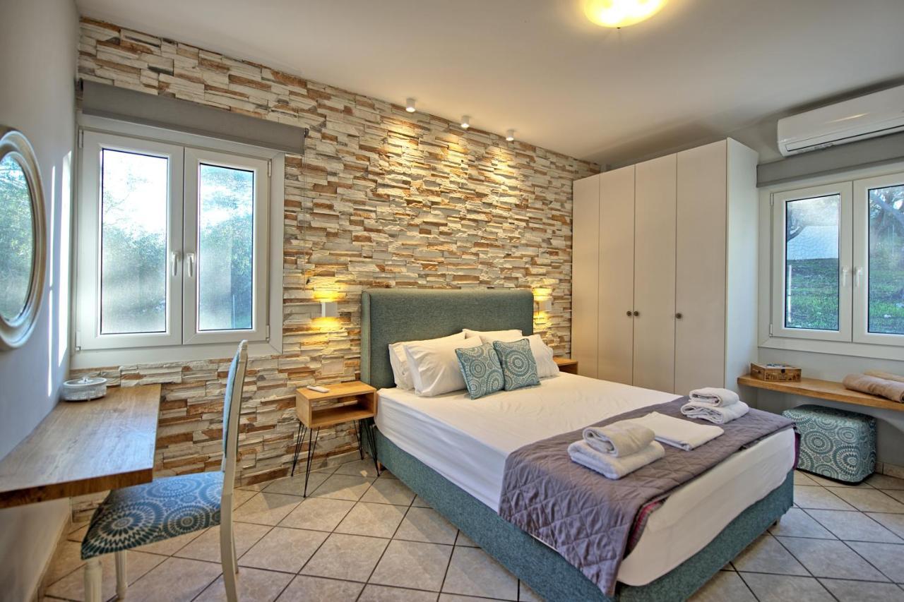 Beachfront Villa Seasun By Posarellivillas Agios Spyridon  Dış mekan fotoğraf