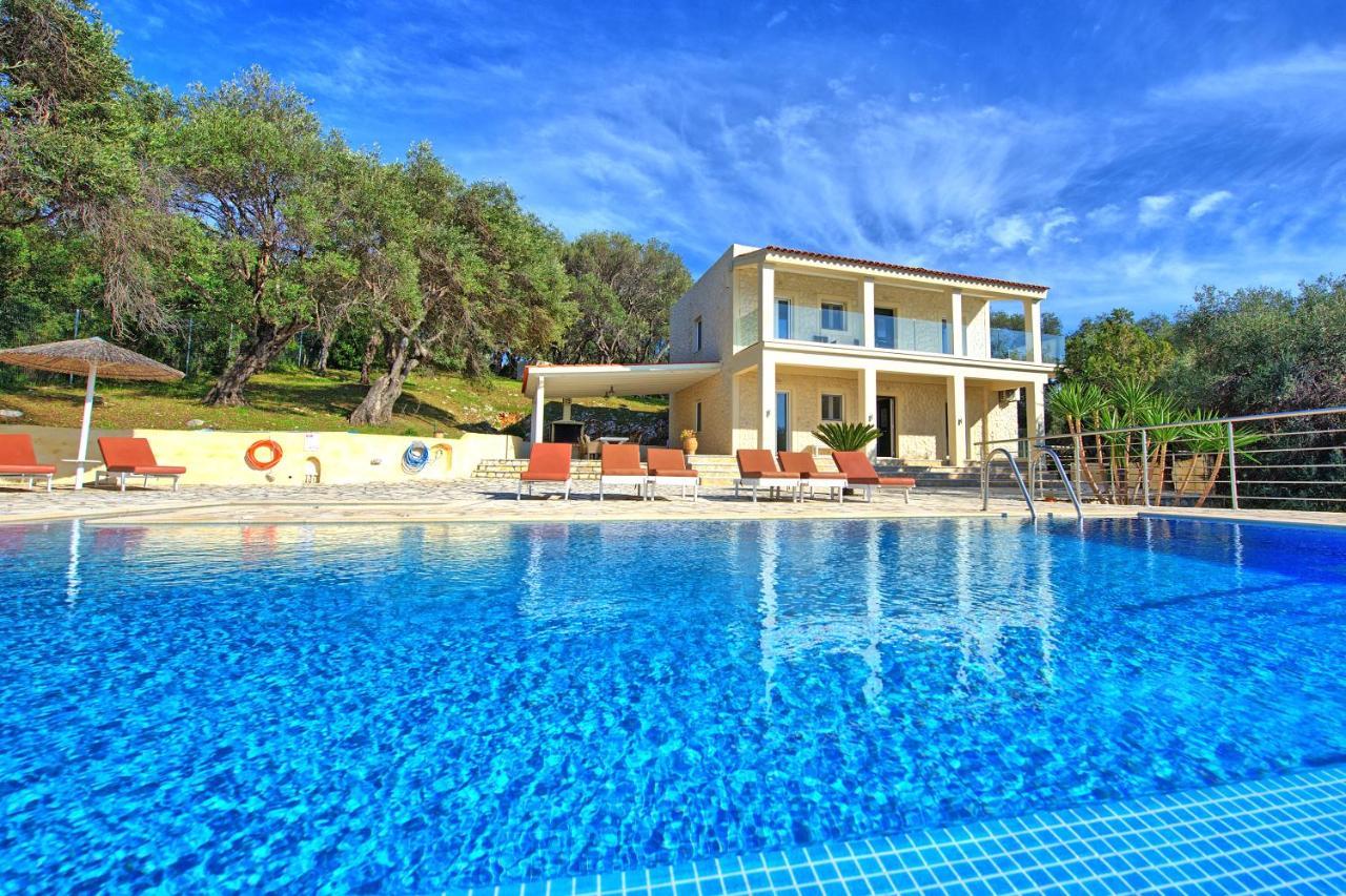 Beachfront Villa Seasun By Posarellivillas Agios Spyridon  Dış mekan fotoğraf