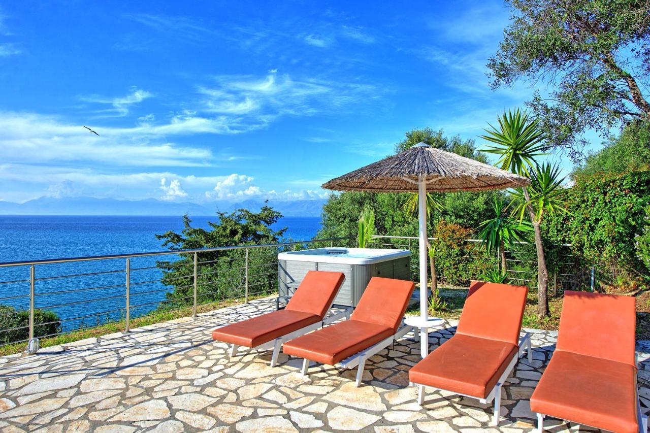 Beachfront Villa Seasun By Posarellivillas Agios Spyridon  Dış mekan fotoğraf