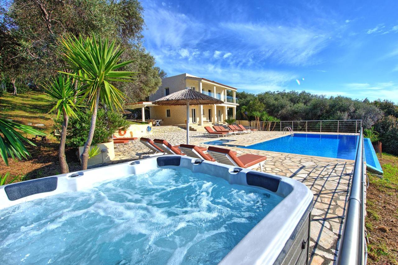 Beachfront Villa Seasun By Posarellivillas Agios Spyridon  Dış mekan fotoğraf