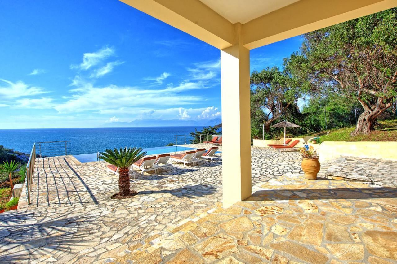 Beachfront Villa Seasun By Posarellivillas Agios Spyridon  Dış mekan fotoğraf